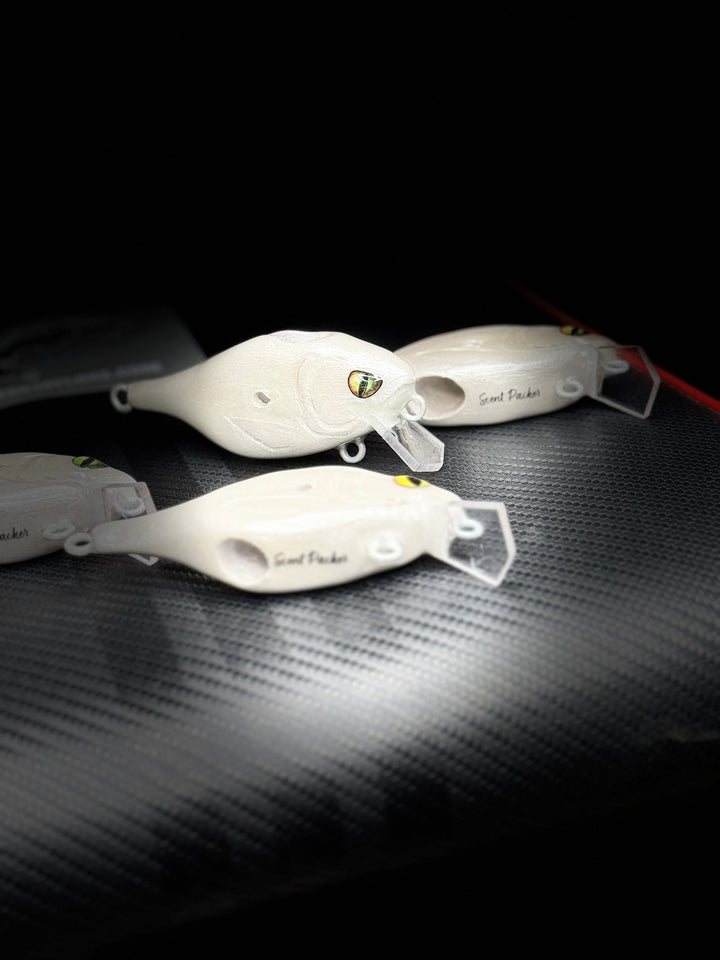 The “Bait-Theft” Scent Packer