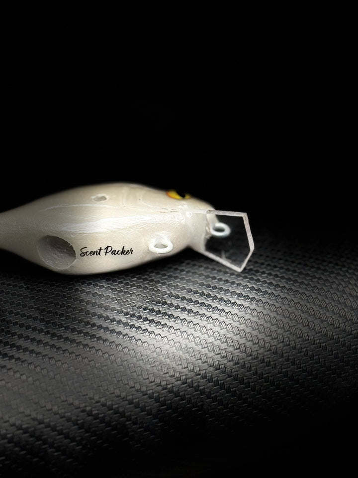The “Bait-Theft” Scent Packer